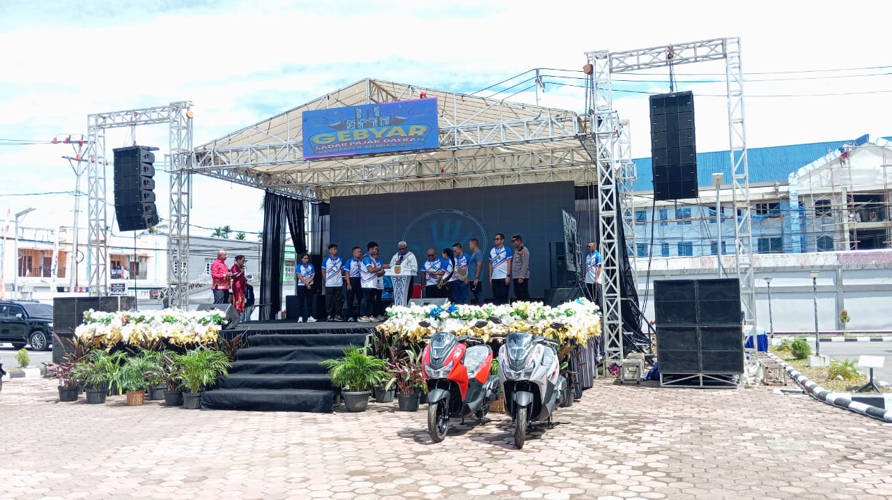 Poster ajakan kesadaran tata pajak Bapenda Mimika